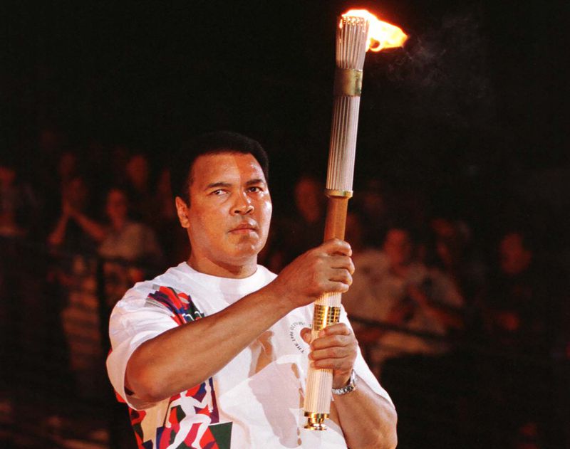 Muhammad Ali lit the cauldron at the opening ceremonies for the 1996 Olympic Games in Atlanta. (Andy Clark / Reuters)