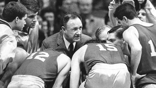 Actor Gene Hackman gives instructions to his players during the movie "Hoosiers".