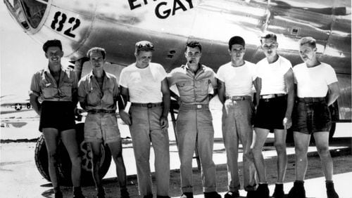 The U.S. ground crew of the Enola Gay, led by pilot Paul W. Tibbets (center), made history by dropping an atomic bomb on the Japanese city of Hiroshima on Aug. 6, 1945.