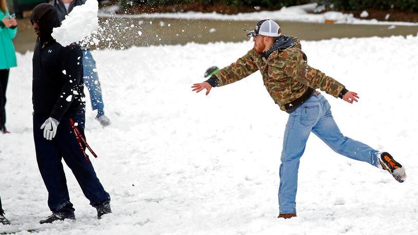 Six Flags Over Georgia had a 1,000-person snowball fight with fake snowballs planned. That is, until real snow had something to say.