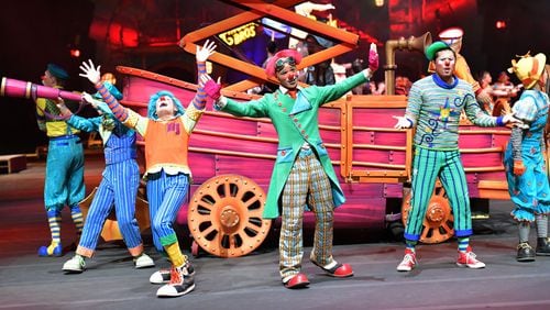 Ringling Bros. and Barnum & Bailey performers are seen during a show at Philips Arena on a recent day. Ivan Vargas is far right with the sideways hat. Matthew Lish is holding the telescope. HYOSUB SHIN / HSHIN@AJC.COM