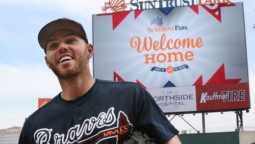 Braves first baseman Freddie Freeman is all smiles as he takes in his new home during the team’s first workout at SunTrust Park on Thursday. (Curtis Compton/ccompton@ajc.com)
