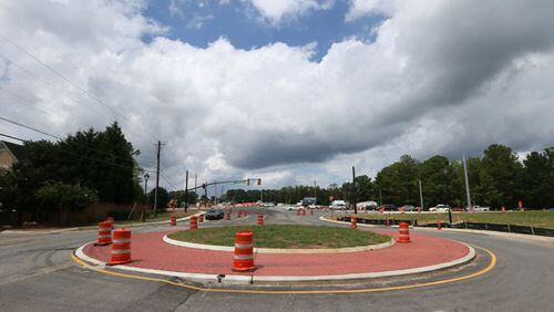 Roundabouts at opposite sides of south Cherokee County, at Wiley Bridge and Cox roads and at Woodstock Road and Victory Drive, are to be designed by Southeastern Engineering Inc. under county contracts totaling $124,000. AJC FILE