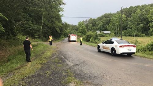 A small, twin-engine plane out of Tennessee crashed on Piney Hill Road in Chatsworth, killing all four people on board. (Credit: Channel 2 Action News)