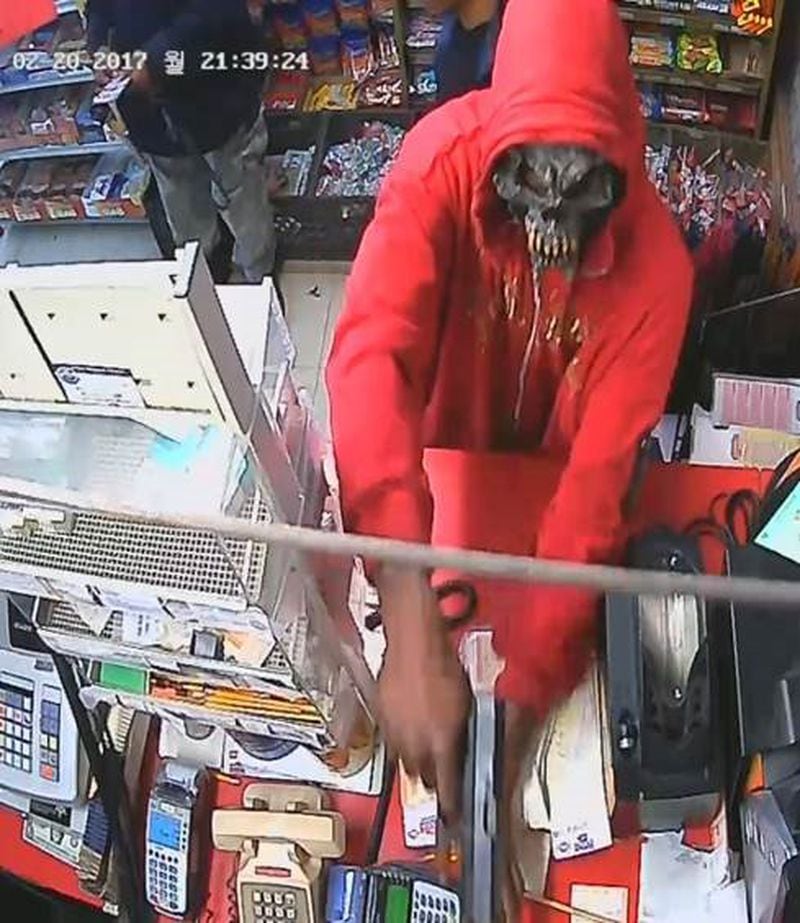 Atlanta police say the gunman wore a red hoodie during an armed robbery Monday. (Credit: Atlanta Police Department)