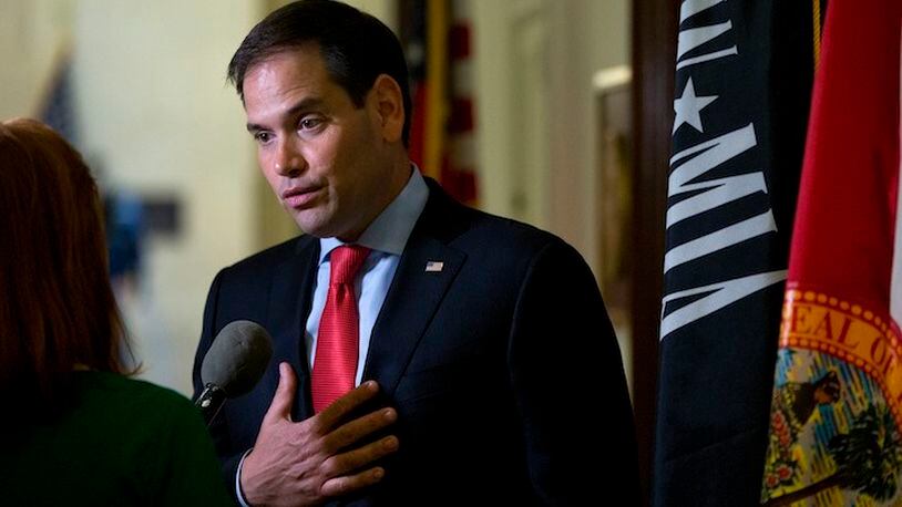 Sen. Marco Rubio, R-Fla., speaks to media outside his office on Capitol Hill in Washington, Wednesday, June 22, 2016. Former Republican presidential candidate Marco Rubio announced Wednesday he will run for re-election to the Senate from Florida, reversing his retirement plans under pressure from GOP leaders determined to hang onto his seat and Senate control. (AP Photo/Carolyn Kaster)