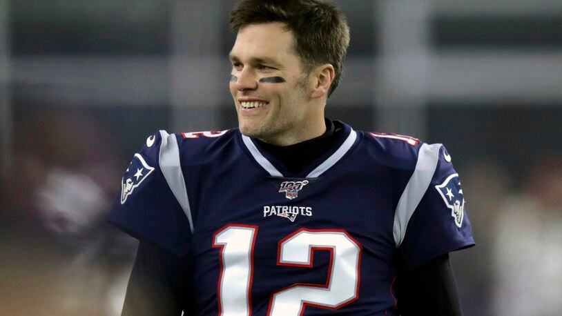Darn Tom Brady's youthful looks - here evidenced before a New England playoff game in January. But surely the calendar doesn't lie. (AP Photo/Charles Krupa)