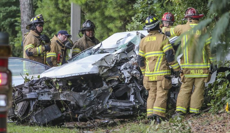 A man was killed and a bystander was nearly hit during the early morning hours of July 10, 2017, after a domestic dispute ended with a police chase and crash in south Fulton County. JOHN SPINK/JSPINK@AJC.COM