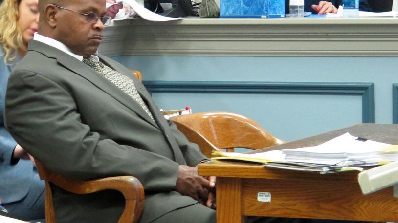 John Wayne Johnson sits at a courtroom table before pleading guilty to five counts of first-degree vehicular homicide and other charges in Pembroke, Ga. on Thursday, July 14, 2016. Johnson was driving a tractor-trailer that slammed into stalled traffic on Interstate 16 west of Savannah on April 22, 2015. The collision killed five nursing students from Georgia Southern University. (AP Photo/Russ Bynum)