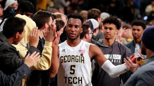 Georgia Tech guard Josh Okogie (5) celebrates with fans after defeating Miami 64-54 in an NCAA college basketball game Wednesday, Jan. 3, 2018, in Atlanta. (AP Photo/John Bazemore)