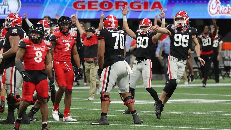 Georgia kicker Jack Podlesny (96) reacts to his game-winning kick to beat Cincinnati 24-21 in the Chick-fil-A Peach Bowl Friday, Jan. 1, 2021, at Mercedes-Benz Stadium in Atlanta. (Curtis Compton / Curtis.Compton@ajc.com)