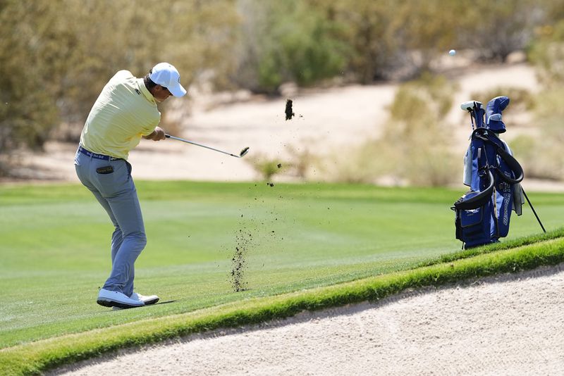 Georgia Tech golfer Christo Lamprecht hits from the second fairway during the final round of the NCAA college men's match play golf championship, Wednesday, May 31, 2023, in Scottsdale, Ariz. (AP Photo/Matt York)