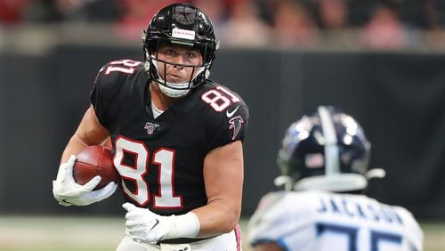Falcons tight end Austin Hooper runs for a first down against the Tennessee Titans in a NFL football game on Sunday, Sept. 29, 2019, in Atlanta.    Curtis Compton/ccompton@ajc.com