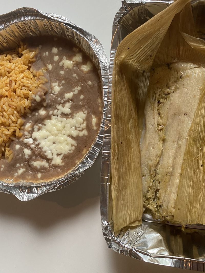 This takeout serving, featuring Mexican rice and beans, and pollo verde tamale, came from Good Word. CONTRIBUTED BY BOB TOWNSEND