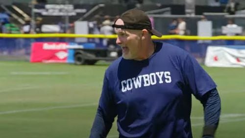 Former Falcon head coach Dan Quinn instructs the defense as a member of the Dallas Cowboys coaching staff in a scene from HBO's Hard Knocks. (Image from YouTube)