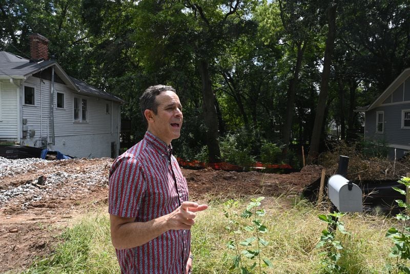 September 8, 2022 Atlanta - Greg Levine, Trees Atlanta’s co-executive director, speaks near a property where several trees marked for removal in Reynoldstown on Thursday, September 8, 2022. Levine says that in addition to an uptick in tree removals, zoning regulations are also putting the city’s tree canopy in jeopardy. (Hyosub Shin / Hyosub.Shin@ajc.com)