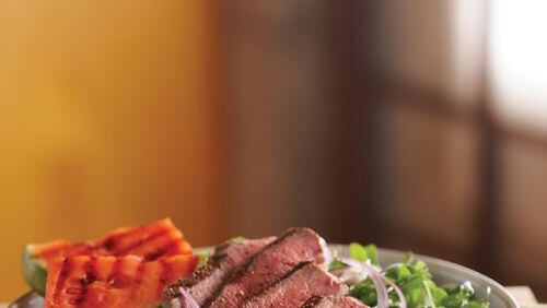 Sunday’s Grilled Steak and Watermelon Salad is paired with baked potato wedges. Contributed by The Beef Checkoff
