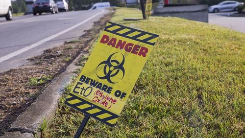 A protest sign placed near the Sterigenics plant warns individuals of ethylene oxide pollution in Smyrna on August 2, 2019. Georgia Health News and WebMD broke the story about medical sterilization plants in Cobb and Newton counties releasing ethylene oxide, a known carcinogen. (Alyssa Pointer/alyssa.pointer@ajc.com)