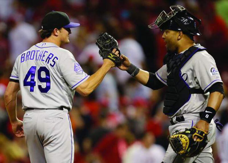  When Rex Brothers was a closer for the Rockies in 2013, he didn't have many nights like the one he had Monday in his first game pitching at Coors Field for the visiting team. He gave up a leadoff triple in the eighth to start a three-run inning in what had been a scoreless game. (AP file photo)