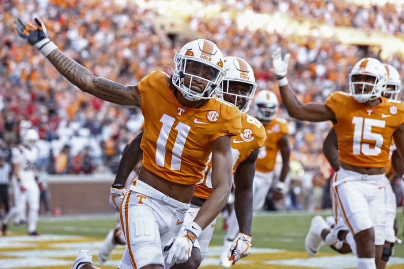 Tennessee wide receiver Jalin Hyatt (11) celebrates his touchdown against Ball State during the first half of an NCAA college football game Thursday, Sept. 1, 2022, in Knoxville, Tenn. (AP Photo/Wade Payne)