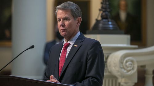 Georgia Gov. Brian Kemp is showing signs he will adopt a campaign strategy for 2022 similar to the one Glenn Youngkin used to win Virginia's race for governor earlier this week. (Alyssa Pointer/Atlanta Journal Constitution)