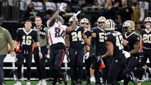 Atlanta Falcons running back Cordarrelle Patterson (84) makes the catch against New Orleans Saints free safety Marcus Williams (43) during the first half of an NFL football game, Sunday, Nov. 7, 2021, in New Orleans. (AP Photo/Butch Dill)