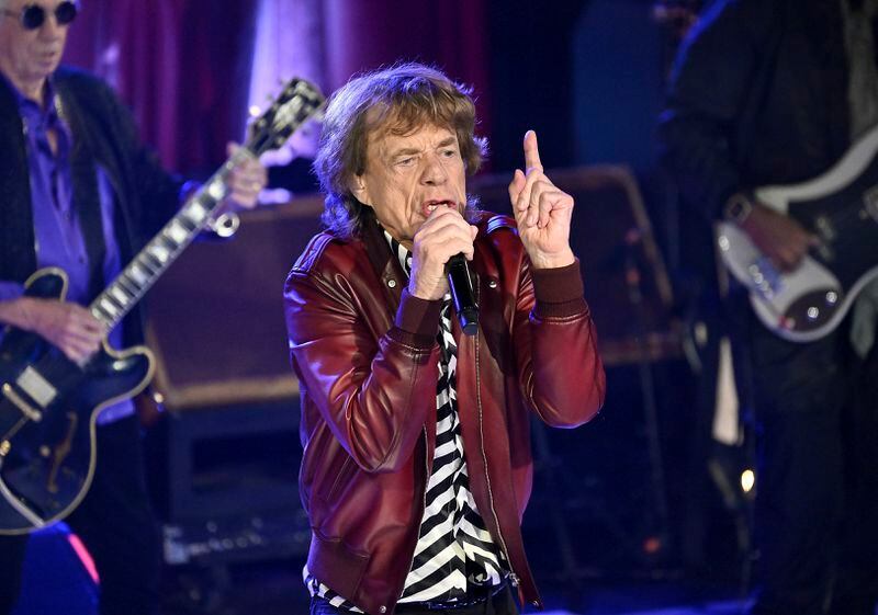 FILE - Mick Jagger of The Rolling Stones performs during a celebration for the release of their new album "Hackney Diamonds," Oct. 19, 2023, in New York. The 2024 New Orleans Jazz & Heritage festival, which spans two weekends, was set to open Thursday, April 25, 2024, with dozens of acts big and small playing daily on 14 stages spread throughout the historic Fair Grounds race course. The Stones play next Thursday, May 2, and tickets for that day of music have long been sold out. (Photo by Evan Agostini/Invision/AP, File)