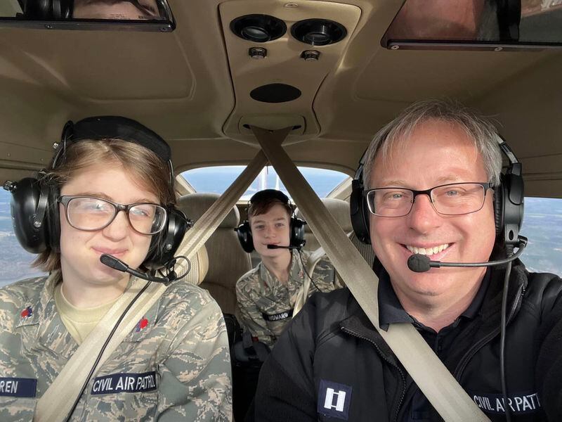 Cadet Airman Rebeca Warren, Cadet Airman Evan Howard, and pilot Richard McLoughlin take to the skies for a Civil Air Patrol aviation lesson. (Courtesy of Civil Air Patrol)