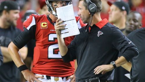 Matt Ryan and offensive coordinator Kyle Shanahan are on the same page, but too many of the quarterback’s passes have been off target. (Curtis Compton / ccompton@ajc.com)