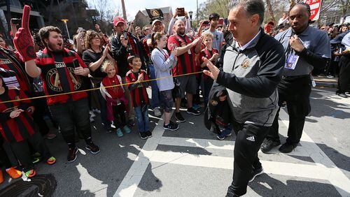 MARCH 18, 2017 Atlanta, Atlanta United fans greet the team as the arrived to the Bobby Dddd Stadium for the second home game of the season against the Chicago Fire.