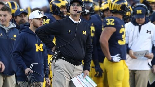 Michigan head coach Jim Harbaugh on the sidelines during action against Illinois on October 22, 2016, at Michigan Stadium in Ann Arbor, Mich. Michigan under Harbaugh is keen on Georgia when it comes to seeking recruits. (Kirthmon F. Dozier/Detroit Free Press/TNS)