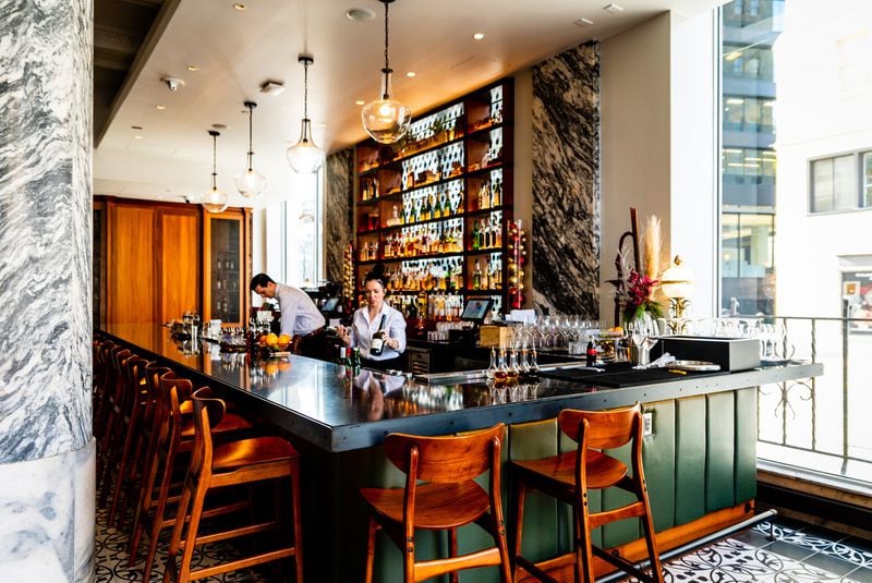 Dining at By George can mean small plates with a drink at the bar. CONTRIBUTED BY HENRI HOLLIS