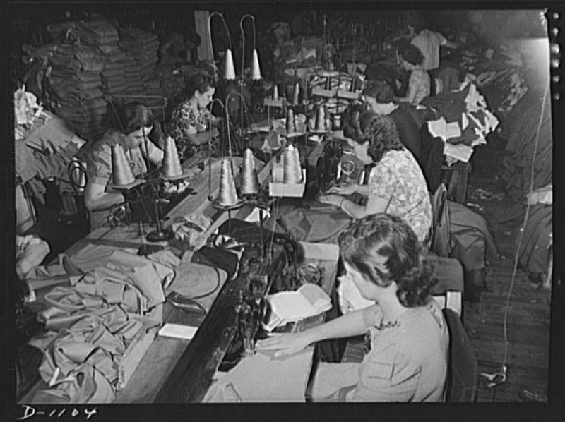 As the nation grew more prosperous, demand for everything from socks to shirts surged, bringing more jobs and drawing many women into the labor force, such as these seamstresses at Kane Manufacturing Company in Louisville, Kentucky, who produced 1,300 Army trousers a day in 1941. (Library of Congress)