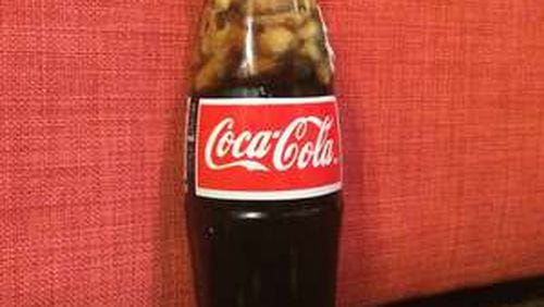 Dumping a packet of salted peanuts into a bottle of Coca-Cola is a decidedly Southern tradition. / Photo by Ligaya Figueras