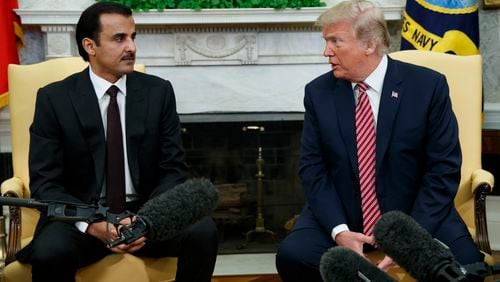 President Donald Trump speaks during a meeting with the Emir of Qatar Sheikh Tamim bin Hamad al-Thani in the Oval Office of the White House, on April 10, 2018. (AP Photo/Evan Vucci)