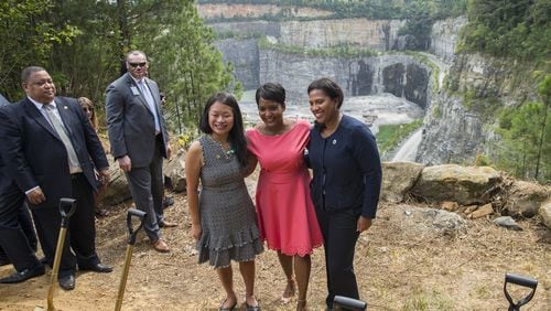 09/06/2018 — Atlanta, Georgia — Atlanta Mayor Keisha Lance-Bottoms (center), former Atlanta Parks and Recreation commissioner Amy Phuong (left) and Atlanta Department of Watershed Management Commissioner Kishia Powell (right) poses for a photograph following the ground breaking ceremony for the new Westside Park at the Bellwood Quarry in Atlanta, Thursday, September 6, 2018. The park, planned for years as both a recreational center and reservoir for drinking water, has been seen as a potential catalyst for redevelopment of the city’s northwest side. (ALYSSA POINTER/ALYSSA.POINTER@AJC.COM)
