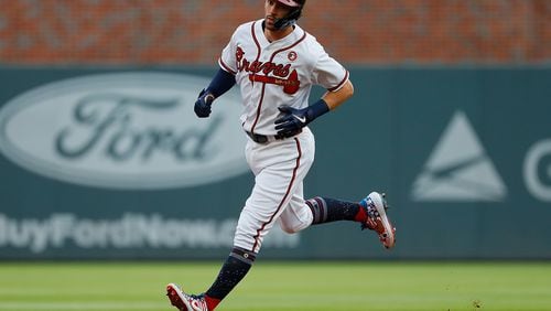 Dansby Swanson #7 of the Atlanta Braves rounds second base after hitting a solo homer in the first inning against the Philadelphia Phillies at SunTrust Park on July 04, 2019 in Atlanta, Georgia. (Photo by Kevin C. Cox/Getty Images)