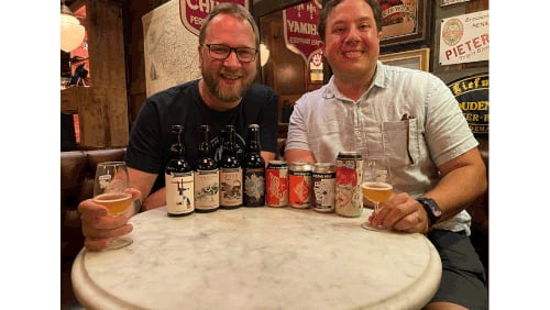 Orpheus Brewing’s Jason Pellet (left) and Second Self Beer Company’s Jason Santamaria having a chat with their beers at Brick Store Pub. /
Bob Townsend for the Atlanta Journal Constitution