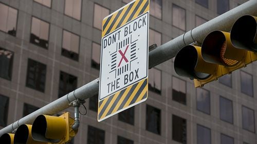 The Gwinnett Department of Transportation recently put up “Don’t Block the Box” signs like the one show in this file photo.