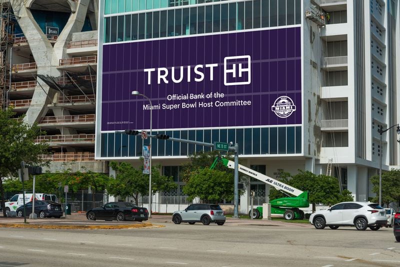 Truist unveiled its new logo Monday. The merged bank said, “Truist Purple, the defining color of the new brand, is the combination of heritage BB&T burgundy and SunTrust blue.” The two “T”s in the logo are said to represent Touch + Technology. (Photo provided by Truist)