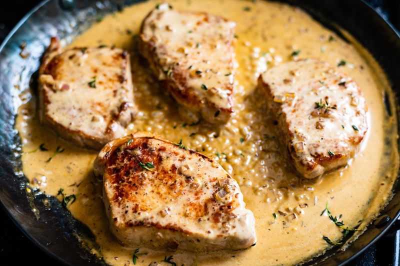 Pork Chops with Mustard Cream Sauce. CONTRIBUTED BY HENRI HOLLIS