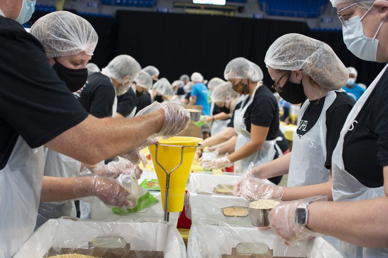 More than 1,000 corporate volunteers will spend the day making more than 150,000 meals for the Atlanta Community Food Bank. 
Photo courtesy of 9/11 Day.