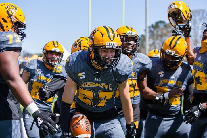 Cade Loden, a freshman defensive back for Kennesaw State, celebrates after recovering a fumble and scoring a touchdown against Dixie State on Saturday, March 20, 2021, at Fifth Third Bank Stadium in Kennesaw. Kennesaw State defeated Dixie State 37-27. CHRISTINA MATACOTTA FOR THE ATLANTA JOURNAL-CONSTITUTION.