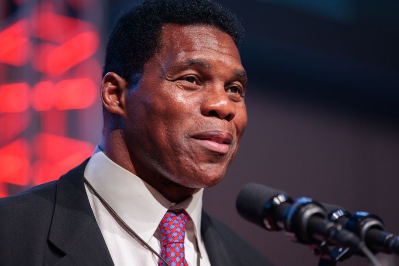 Republican Herschel Walker, who lost his 2022 bid for the U.S. Senate, is not mentioned in a new report on the election. (Arvin Temkar/The Atlanta Journal-Constitution)