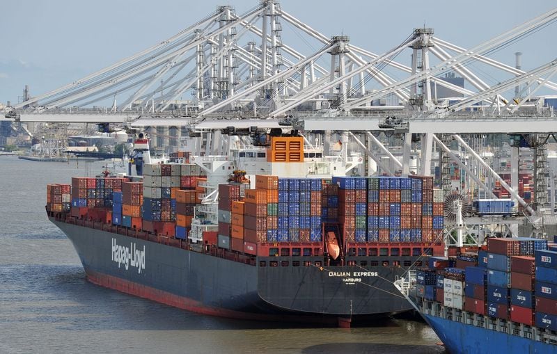 Ships are loaded and unloaded in the Port of Savannah in 2014. AJC File
