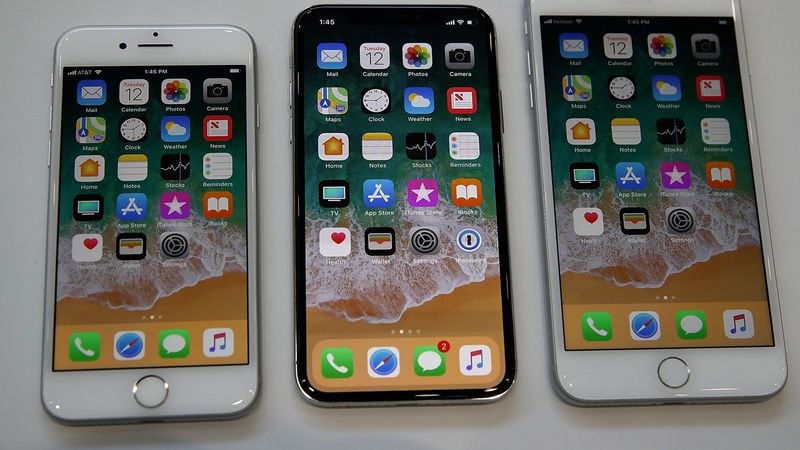 FILE PHOTO: Some iPhone 8 models (left) have been recalled due to a logic board manufacturing defect.