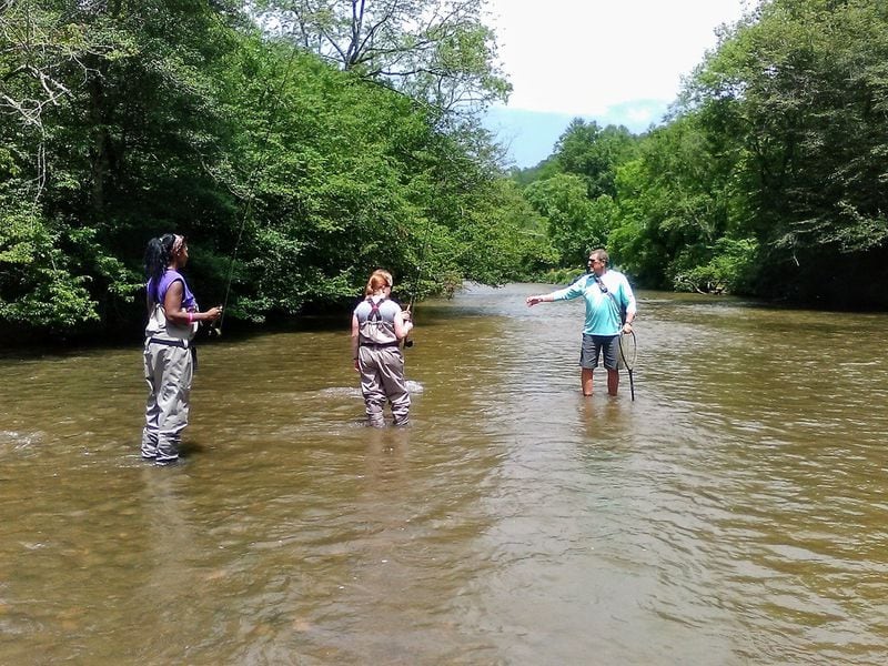 Alex Bell of AB’s Fly Fishing Guide Service in Sylva, N.C., leads a fly-fishing expedition on Tuckasegee River, part of the Western North Carolina Fly Fishing Trail. Contributed by Blake Guthrie