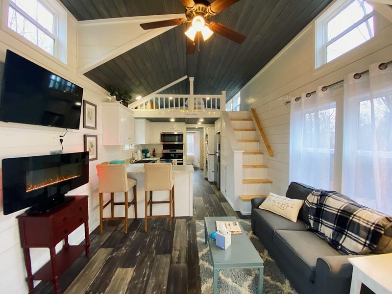 Get a taste of tiny house living at Cricket by the Creek, part of a mountaintop tiny home community in northwest Georgia. Courtesy of Airbnb