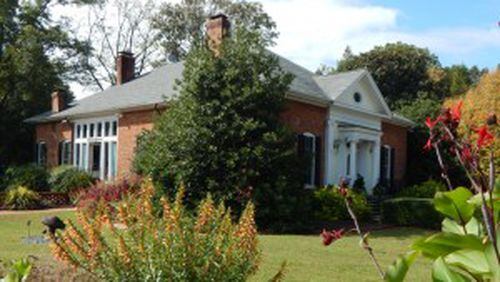 Kennesaw’s Smith-Gilbert Gardens, 2382 Pine Mountain Road, will have a new visitor’s center. Among the gardens’ features is the Hiram Butler House - built around 1882 and on the National Register of Historic Homes. Courtesy of Kennesaw