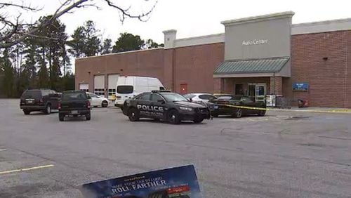 The man was shot in the Walmart parking lot and then ran back inside the store.